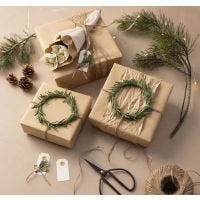 Gifts with green crepe paper wreaths